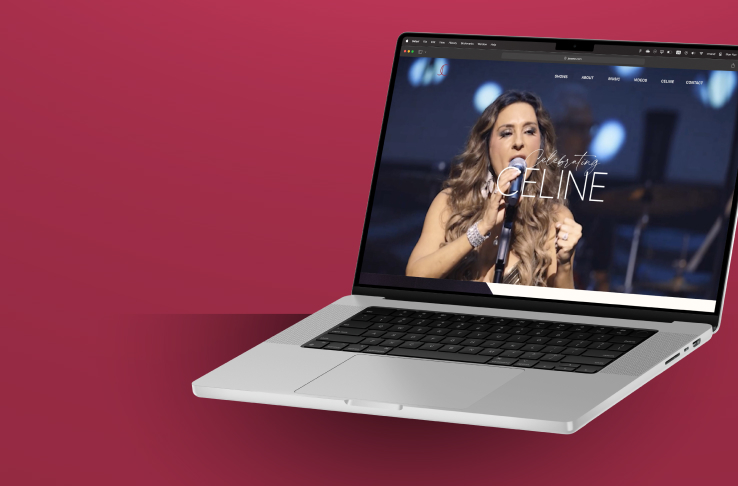 Laptop mockup displaying a Jenene wensite promoting 'Celebrating Celine' with a singer performing a song, sorrounded in a rosey hue background.