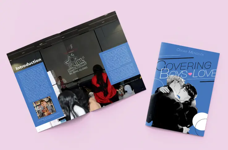 Editorial book design mockup titled ‘Covering Boys’ Love,’ showcasing interior spreads and a blue cover exploring visual culture and queer narratives.
